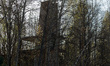 The Prypiat river transport stop is visible behind trees in Prypiat, a city abandoned due...