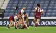 Huddersfield defense makes a tackle during the BetFred Super League match between Huddersf...