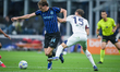 Juan Rodriguez of Cagliari Calcio and Pio Esposito of FC Internazionale compete for the ba...