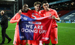 Frank Onyeka, Jack Rudoni, and Bobby Thomas of Coventry City celebrate promotion back to t...