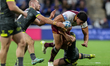 Chris Patola is tackled during the BetFred Super League match between Huddersfield Giants...