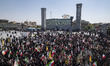Iranian demonstrators wave national flags and hold portraits of Iran's Supreme Leader Ayat...