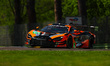 Antares Au (HKG), Thomas Fleming (GBR), and Marvin Kirchhofer (GER) drive the #10 McLaren...