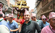 Member of Parliament Jagadish Kharel carries the palanquin during the 5th Janku (Maha Divy...