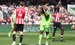 Ryan Sessegnon of Fulham (right) reacts after his attempt to score during the Premier Leag...