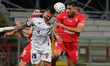 Edoardo Lancini of Campobasso FC and Daniele Montevago of AC Perugia Calcio compete for th...