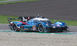 Frederic Makowiecki, Jules Gounon, and Victor Martins of the Alpine Endurance Team drive t...