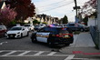 Police work at the scene where four people are reported injured in a shooting in the area...