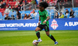 Jayden Nelson #7 of Austin FC drives the ball forward during the Major League Soccer match...