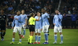 FIFA referee Tori Penso (center) officiates during the match between Charlotte FC and New...