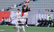 Forge FC defender Dan Nimick (#5) heads the ball clear between Cavalry FC players during a...