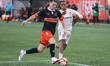 Forge FC defender Dan Nimick (left) competes with Cavalry FC forward Ali Musse (right) dur...
