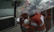 Members of the Iranian Red Crescent Society's search-and-rescue team participate in a trai...