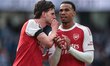 Declan Rice of Arsenal speaks to Gabriel of Arsenal after losing 2-1 during the Premier Le...