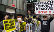Members of Rise and Resist and their supporters protest outside Trump Tower in Midtown Man...