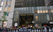 Members of Rise and Resist and their supporters protest outside Trump Tower in Midtown Man...
