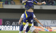 Isaac Aguiar Tomich of Hellas Verona FC competes for the ball with Samuele Ricci of AC Mil...