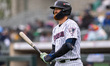 Tyler Hardman of the Somerset Patriots heads to the plate during a Minor League Baseball g...