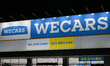 KUDAMATSU, JAPAN - APRIL 18:
The large, illuminated blue-and-white 'WECARS' signage of th...