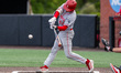 Sean Britt of the St. John's Red Storm hits the ball during an NCAA baseball game at Baint...