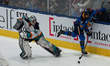 Goalie Kayle Osborne #82 of the New York Sirens pressures Forward Jesse Compher #18 of the...