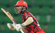 David Warner plays a shot during the Pakistan Super League (PSL) match between Karachi Kin...