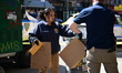 NYPD investigators collect evidence at the scene where one man is killed and another man i...