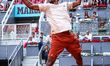 Gael Monfils of France competes against Camilo Ugo Carabelli of Argentina during their Men...