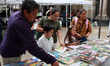 People visit the Tlalpan Mayor's Office to buy books in celebration of International Book...