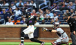Bo Bichette of the New York Mets, wearing jersey number 19, singles during the first innin...