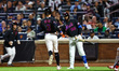 New York Mets player Carson Benge #3 scores during the second inning of a baseball game ag...