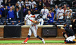 Minnesota Twins player Tristan Gray #4 singles during the ninth inning of a baseball game...