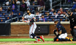 Minnesota Twins player Byron Buxton, number 25, doubles during the ninth inning of a baseb...