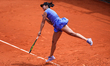 Alexandra Eala of the Philippines competes against Elise Mertens of Belgium during their W...