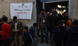 Palestinian voters arrive to cast their ballots at a polling station during municipal elec...