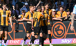 James Gibbons of Cambridge United celebrates after scoring the team's second goal during t...
