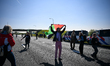 Police carry out numerous arrests following a protest that blocks a major roadway near De...