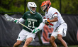 Julian Navab of the Dartmouth Big Green drives the ball against Jackson Green of the Princ...