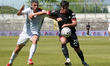 Giacomo Zecca of Torres and Samuele Righetti of SS Arezzo compete for the ball during the...