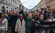People carry banners while attending an animal rights march 'Break the chains' in memory o...