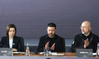 Ukraine's President Volodymyr Zelenskiy (center), Moldova's President Maia Sandu (left), a...