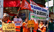 Demonstrators gather outside the People's Party (PP) headquarters on Calle Genova in Madri...