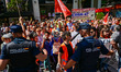 Demonstrators gather outside the People's Party (PP) headquarters on Calle Genova in Madri...