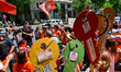 Demonstrators gather outside the People's Party (PP) headquarters on Calle Genova in Madri...