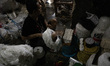 Workers spin yarn inside a textile facility in Kebayoran, South Jakarta, Indonesia, on Apr...