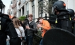 Police officers intervene during an attempted squatting of a building at Prinsengracht 437...