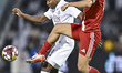 Mohamed Camara of Al Sadd SC and Baghdad Bounedjah of Al-Shamal SC compete during the Doha...