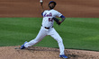 New York Mets relief pitcher Carl Edwards Jr. #52 throws during the fourth inning of a bas...