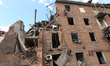 An apartment block lies in ruins in Dnipro, Ukraine, on April 27, 2026, after being hit by...
