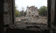 An apartment block lies in ruins in Dnipro, Ukraine, on April 27, 2026, after being hit by...